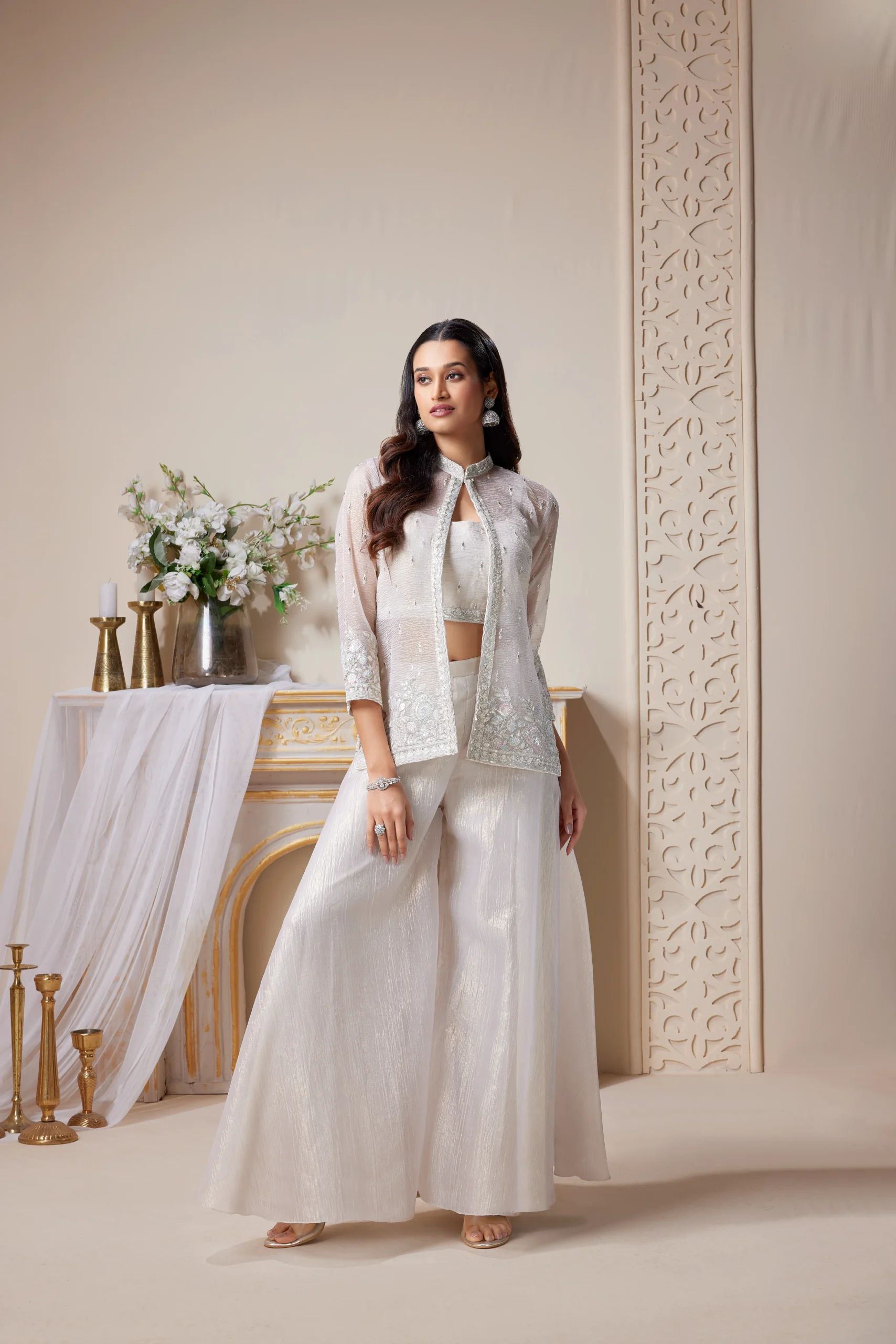 Model in a white RP Dalmia kurta set