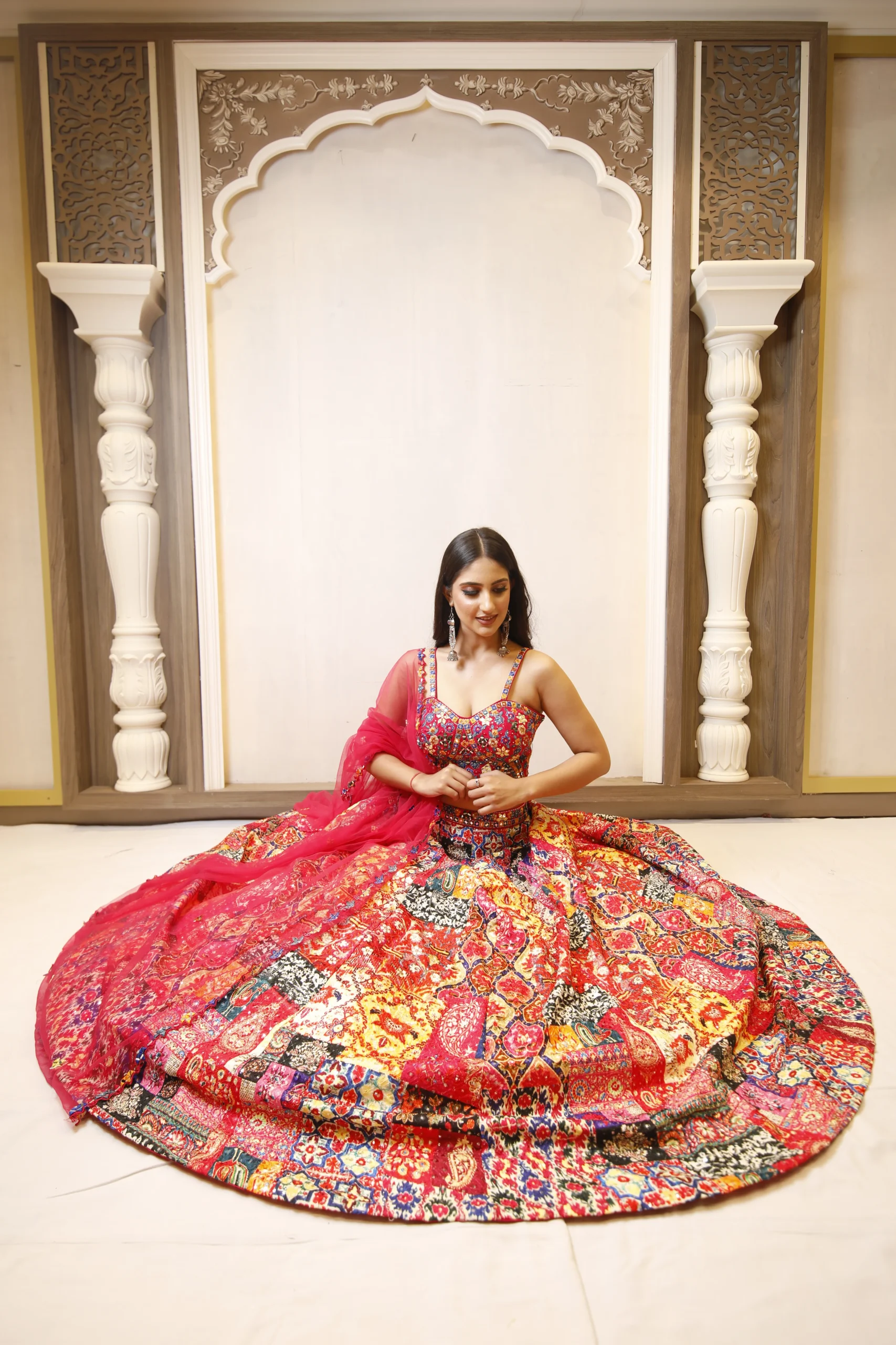 RP Dalmia red lehenga with a wide ghera