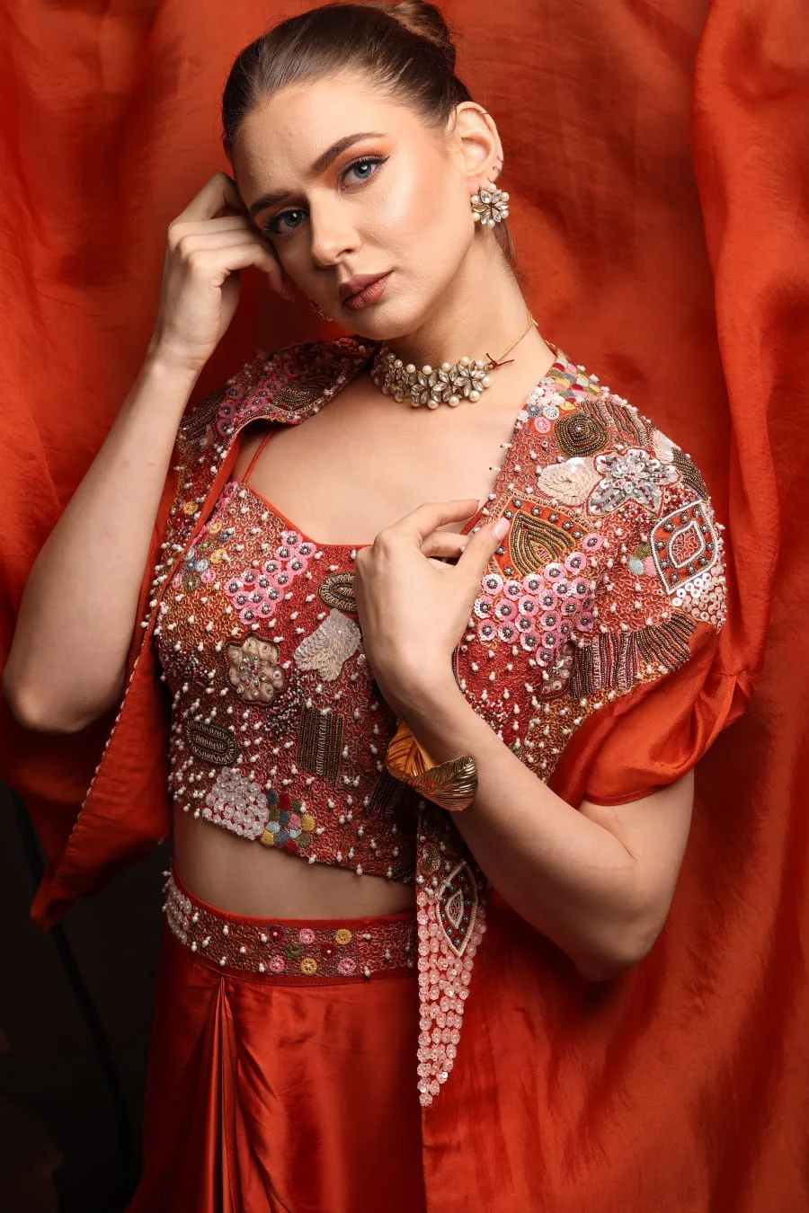 RP Dalmia rust satin saree with embellished blouse