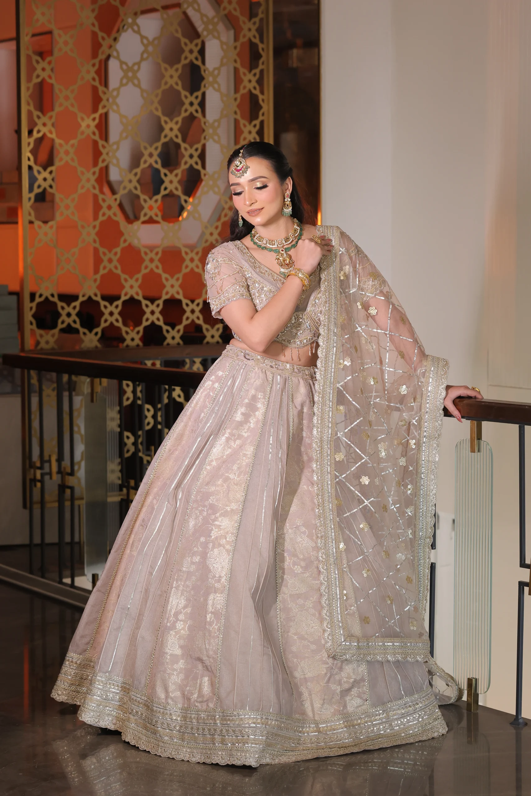 RP Dalmia champagne lehenga with net dupatta